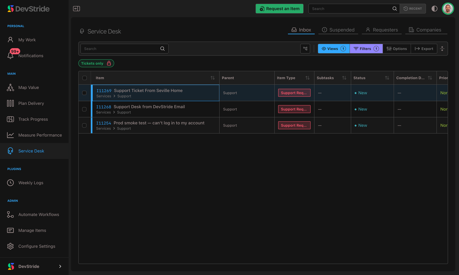 The Service Desk Inbox — customer requests tracked as work items, with the Inbox, Suspended, Requesters, and Companies tabs.